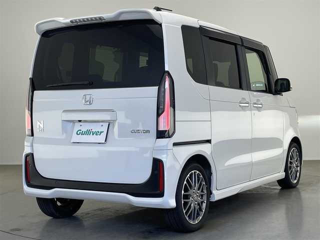 ホンダ Ｎ ＢＯＸ カスタム ターボ 愛知県 2024(令6)年 0.9万km プラチナホワイトパール 純正９型ナビ　フルセグＴＶ　ＤＶＤ　カープレイ　バックカメラ　ハーフレザー　シートヒーター　ＥＴＣ　両側パワースライドドア　ホンダセンシング　衝突軽減　追従クルコン　ＬＥＤオートライト　フォグ　禁煙車