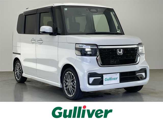 ホンダ Ｎ ＢＯＸ カスタム ターボ 愛知県 2024(令6)年 0.9万km プラチナホワイトパール 純正９型ナビ　フルセグＴＶ　ＤＶＤ　カープレイ　バックカメラ　ハーフレザー　シートヒーター　ＥＴＣ　両側パワースライドドア　ホンダセンシング　衝突軽減　追従クルコン　ＬＥＤオートライト　フォグ　禁煙車