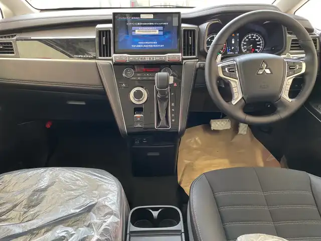 三菱 デリカＤ：５ シャモニー 埼玉県 2025(令7)年 0.1千km グレー e-Assist/11インチナビ/ CD/DVD/BT/USB/HDMI/フルセグ/全方位カメラ/12.8インチ後席モニター/両側電動スライドドア/ハーフレザーシート/パドルシフト/レーダークルーズコントロール/レーンキープアシスト/純正18インチアルミホイール/オートブレーキホールド/スマートキー×2/禁煙車