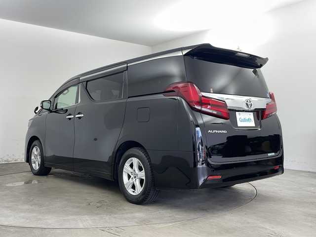 トヨタ アルファード X 兵庫県 2018(平30)年 5.4万km ブラック ・11インチアルパインナビ/・Bluetooth/フルセグTV/CD/DVD/SD/USB/・Toyota Safety Sense/・プリクラッシュセーフティ/・レーントレーシングアシスト［LTA］/・レーダークルーズコントロール（全車速追従機能付）/・ロードサインアシスト［RSA］/・オートマチックハイビーム［AHB］/・先行車発進告知機能［TMN］/・クリアランスソナー＆バックソナー/・ドライブスタートコントロール/・VDIM/・横滑り防止装置/・アルパインリアフリップダウンモニター/・片側パワースライドドア/・ステアリングリモコン/・電動パーキングブレーキ/・ブレーキホールド/・ハーフレザー調シートカバー/・純正フロアマット/・LEDオートライト/・フォグランプ/・純正16インチアルミホイール/・ビルドインETC/・スマートキー/・スペアキー/・W＋サイドエアバッグ/・カーテンエアバッグ