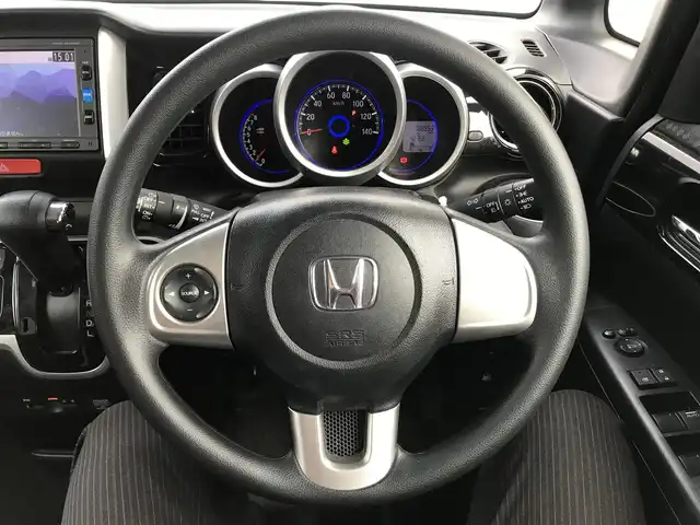 ホンダ Ｎ ＢＯＸ カスタム G Lパッケージ 栃木県 2016(平28)年 8.9万km シャイニンググレーM 株)IDOMが運営する【じしゃロン小山店】の自社ローン専用車両になります。こちらは現金またはオートローンご利用時の価格です。自社ローンご希望の方は別途その旨お申付け下さい//禁煙車/純正フルセグナビ/（CD/DVD/AM/FMラジオ）/(Bluetooth)/スマートキー/プッシュスタート/バックカメラ/ＥＴＣ/片側パワースライドドア/チップアップシート/アイドリングストップ/電動格納ドアミラー/パワーウインドウ/オートライト