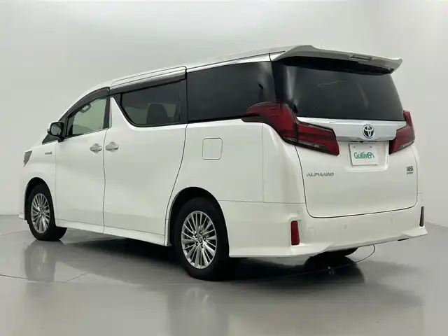トヨタ アルファードハイブリット SR Cパッケージ 熊本県 2019(令1)年 5.9万km ホワイトパールクリスタルシャイン ４WD/ツインムーンルーフ/JBLサウンド/リアエンターテイメントシステム/純メーカーナビ（ＣＤ・ＤＶＤ・フルセグ・ＢＴ）/パノラミックビュモニター/純正フリップダウンモニター　/前後ドライブレコーダー　/ビルトインＥＴＣ２．０　/トヨタセーフティーセンス/・プリクラッシュセーフティ/・レーンキープアシスト/・ロードサインアシスト/・ブラインドスポットモニター/・駐車時支援パーキングサポートシステム/・先行車発進お知らせ機能/・オートハイビーム/両側パワースライドドア　/前後クリアランスソナー/パワーバックドア　/前席・２列目シートヒーター/前席エアーシート/ステアリングヒーター/オットマン/デジタルインナーミラー/AC100V/横滑り防止/レザーシート/電動パーキング/ブレーキホールド/純正フロアマット/純正17インチAW/オートライト/三眼LEDヘッドライト/フォグランプ/スマートキー/プッシュスタート