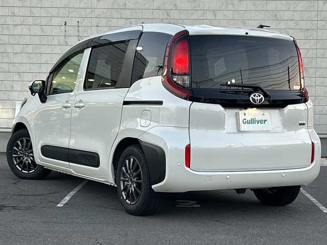 トヨタ シエンタ ハイブリッド G 長野県 2023(令5)年 1.3万km ホワイトパールクリスタルシャイン ・純正8インチディスプレイオーディオ/・バックカメラ/・ビルトインETC/・プリクラッシュセーフティ/・オートマチックハイビーム/・レーダークルーズコントロール/・レーンキープアシスト/・ブラインドスポットモニター/・両側パワースライドドア/・社外15インチアルミホイール/・純正AW付き夏タイヤ積込有り/・横滑り防止装置/・LEDヘッドライト/・オートライト/・コーナーセンサー/・純正フロアマット/・ウィンカーミラー/・電動格納ミラー/・スマートキー/・エンジンプッシュスタート