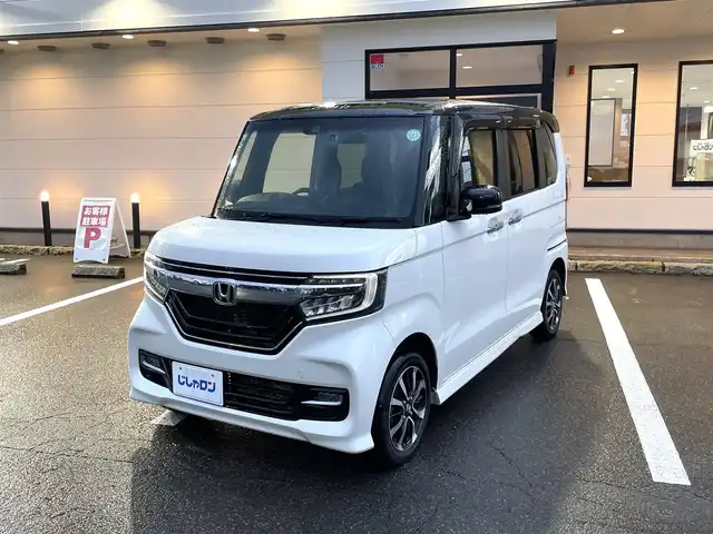 ホンダ Ｎ ＢＯＸ 2トン カスタム G L ホンダセンシング 青森県 2017(平29)年 10.1万km プレミアムホワイトパールⅡ (株)IDOMが運営する【じしゃロン青森店】の自社ローン専用車両になりますこちらは現金ご利用時の価格です。自社ローンご希望の方は別途その旨お申付け下さい。/４ＷＤ/人気のツートンカラー/純正８インチＳＤナビ/　AM/FM/CD/DVD/SD/BT/フルセグＴＶ/バックカメラ/純正ドライブレコーダー/ビルトインＥＴＣ/両側パワースライドドア/クルーズコントロール/ＥＣＯＮモード/衝突被害軽減システム/レーンキープアシスト/横滑り防止装置/オートライト/ＬＥＤヘッドランプ/フォグランプ/シートヒーター（D/N）/ドアミラーヒーター/プラズマクラスターイオン/ドアバイザー/純正フロアマット/純正１４インチアルミホイール装着