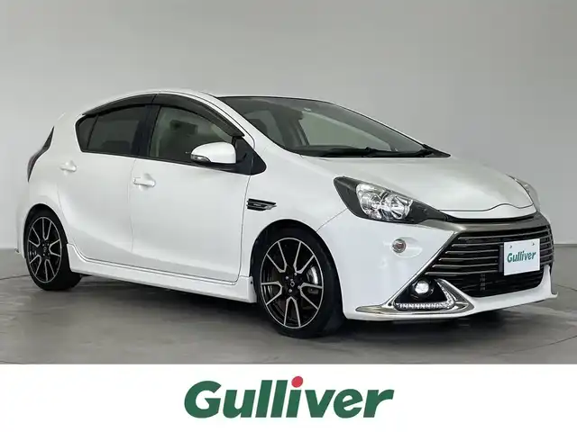 トヨタ アクア G G’s 埼玉県 2015(平27)年 4.5万km ライムホワイトパールクリスタルシャイン クルーズコントロール/純正ナビ/（Bluetooth/CD/DVD/フルセグ)/バックカメラ/ETC/ステアリングスイッチ/シートヒーター/ナノイーエアコン/オートLEDヘッドライト/フォグランプ/スマートキー/スペアキー/ドアバイザー/プッシュスタート/電動格納ミラー/VSC（横滑り防止装置）