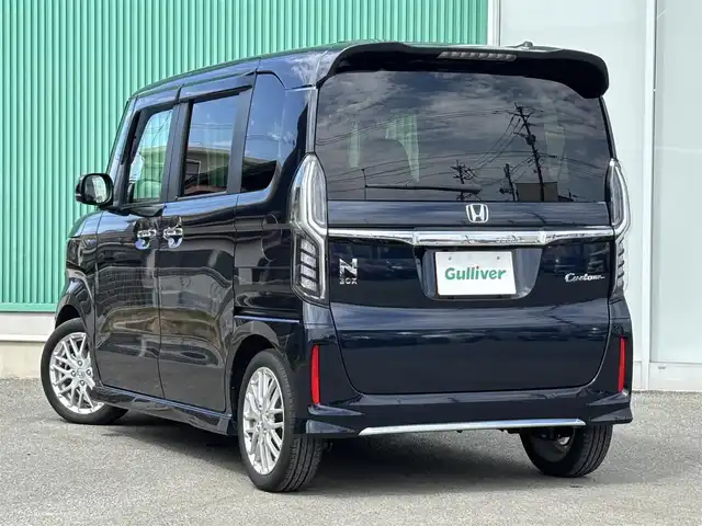 ホンダ Ｎ ＢＯＸ カスタム L ターボ 福岡県 2021(令3)年 2.7万km ミッドナイトブルービームM ホンダセンシング/純正ナビ/【CD/DVD/BT/USB/SD】/フルセグTV/バックカメラ/ETC/ステアリングスイッチ/クルコン/両側パワスラ/シートヒーター/ハーフレザーシート/コーナーセンサー/アイドリングストップ/純正マット/純正アルミ/ドアバイザー/プッシュスタート/スマートキー/取説/保証書