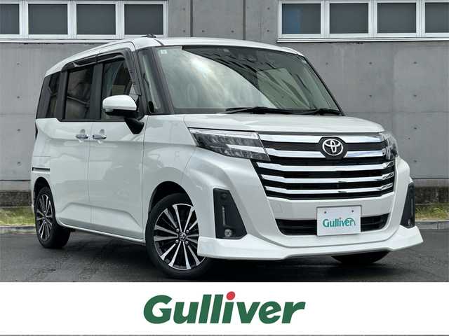 トヨタ ルーミー カスタムG－T 静岡県 2021(令3)年 4.1万km パールホワイトⅢ Toyota Safety Sense/社外9インチメモリーナビ(AVIC-RQ911)/　AM FM CD DVD Bluetooth AUX/ビルトインETC/ドライブレコーダー/LEDオートヘッドライト/デジタルルームミラー/シートヒーター(前席)/LEDルームライト/両側パワースライドドア/ステアリングスイッチ/スマートキー2本/社外充電ポート/フルセグTV/アラウンドビューモニター