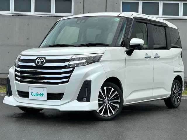 トヨタ ルーミー カスタムG－T 静岡県 2021(令3)年 4.1万km パールホワイトⅢ Toyota Safety Sense/社外9インチメモリーナビ(AVIC-RQ911)/　AM FM CD DVD Bluetooth AUX/ビルトインETC/ドライブレコーダー/LEDオートヘッドライト/デジタルルームミラー/シートヒーター(前席)/LEDルームライト/両側パワースライドドア/ステアリングスイッチ/スマートキー2本/社外充電ポート/フルセグTV/アラウンドビューモニター