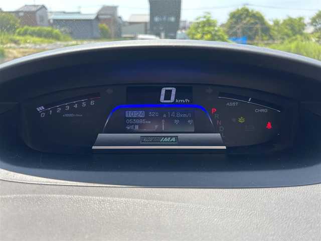 ホンダ フリード ハイブリット 富山県 2014(平26)年 5.4万km プレミアムスパークルブラックパール クルーズコントロール/横滑り防止装置/盗難防止装置/社外SDナビ/フルセグTV/DVD再生/バックカメラ/ビルトインETC/ドライブレコーダー/LEDオートライト/両側パワースライドドア/ウォークスルー/ドアバイザー/スマートキー