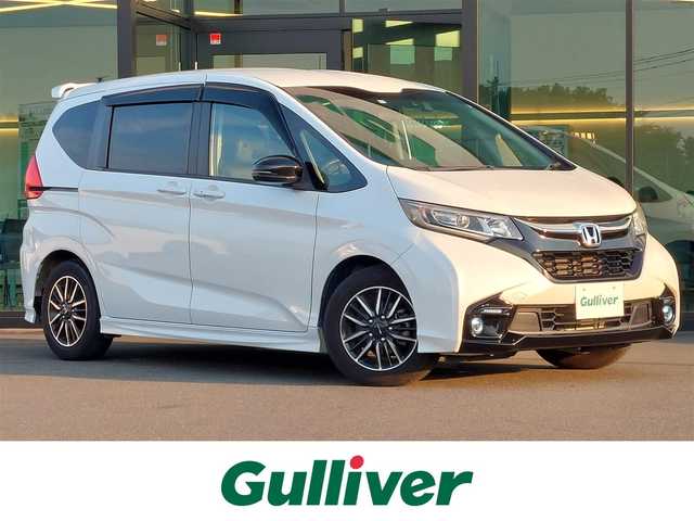 ホンダ フリード モデューロX ホンダセンシング 東京都 2018(平30)年 5万km ホワイトオーキッドパール Cパッケージ/コンフォートビューパッケージ/純正9インチナビ/バックカメラ/ビルトインETC/ドライブレコーダー/両側パワースライドドア/ハーフレザーシート/衝突軽減ブレーキ/レーンキープアシスト/レーダークルーズコントロール/アイドリングストップ/スマートキー