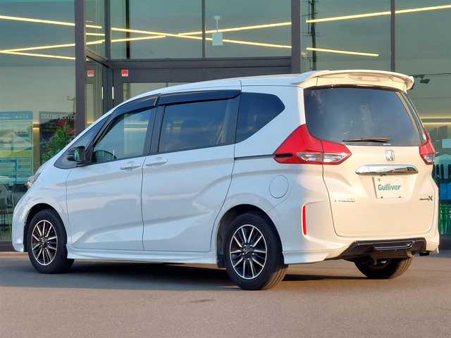 ホンダ フリード モデューロX ホンダセンシング 東京都 2018(平30)年 5万km ホワイトオーキッドパール Cパッケージ/コンフォートビューパッケージ/純正9インチナビ/バックカメラ/ビルトインETC/ドライブレコーダー/両側パワースライドドア/ハーフレザーシート/衝突軽減ブレーキ/レーンキープアシスト/レーダークルーズコントロール/アイドリングストップ/スマートキー