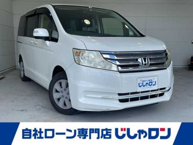ホンダ ステップワゴン G Eセレクション 沖縄県 2014(平26)年 5.4万km ホワイトオーキッドパール (株)IDOMが運営する【じしゃロンコザ店】の自社ローン専用車両になりますこちらは現金またはオートローンご利用時の価格です。自社ローンご希望の方は別途その旨お申付け下さい/CD再生　/片側パワースライドドア　/ETC　/クルーズコントロール/アイドリングストップ　/スマートキー　/コーナーセンサー　/純正フロアマット　/パワーステアリング　/パワーウィンドウ　