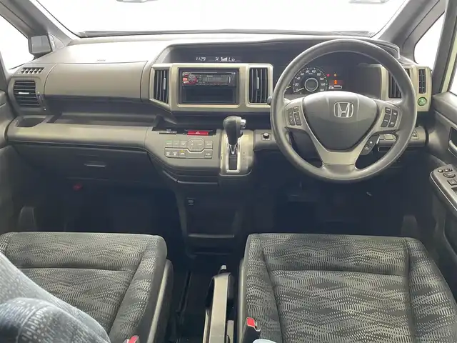 ホンダ ステップワゴン G Eセレクション 沖縄県 2014(平26)年 5.4万km ホワイトオーキッドパール (株)IDOMが運営する【じしゃロンコザ店】の自社ローン専用車両になりますこちらは現金またはオートローンご利用時の価格です。自社ローンご希望の方は別途その旨お申付け下さい/CD再生　/片側パワースライドドア　/ETC　/クルーズコントロール/アイドリングストップ　/スマートキー　/コーナーセンサー　/純正フロアマット　/パワーステアリング　/パワーウィンドウ　