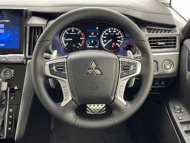 三菱 デリカＤ：５ ブラックエディション 千葉県 2025(令7)年 0.1千km ホワイトダイヤモンド 登録済未使用車/衝突軽減ブレーキ/レーンキープアシスト/レーダークルーズコントロール/社外メモリナビ/（フルセグ/Bluetooth/CD/DVD/FM/AM）/バックカメラ/フリップダウンモニター/アイドリングストップ/ステアリングヒーター/パドルシフト/LEDヘッドライト/電動格納ミラー