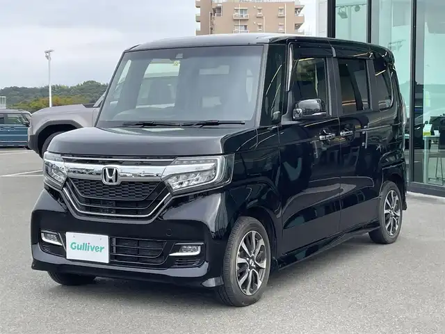 ホンダ Ｎ ＢＯＸ カスタム G L ホンダセンシング 東京都 2019(令1)年 3.5万km クリスタルブラックパール ホンダセンシング/・衝突軽減ブレーキ/・誤発進抑制機能/・アダプティブ・クルーズ・コントロール/・車線維持支援システム/・後方誤発進抑制機能/・オートハイビーム/純正ナビ　/・ＡＭ／ＦＭ／ＣＤ／ＤＶＤ/・フルセグＴＶ／Ｂｌｕｅｔｏｏｔｈ /両側パワースライドドア　/バックカメラ　/ＥＴＣ　/Ｄ／Ｎシートヒーター /エンジンスタートボタン/スマートキー/運転席用&助手席用i-SRSエアバッグシステム/ブラック塗装＋切削 14インチアルミホイール/充電用USBジャック/純正フロアマット