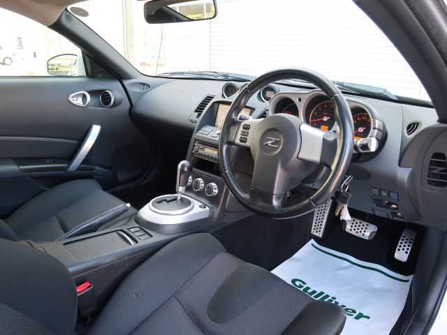 日産 フェアレディ Ｚ 石川県 2007(平19)年 15.3万km ホワイトパール リモコンキー/スペアキー/ステアリングリモコン/純正DVDナビゲーション/バックモニター/HIDライト/電動格納ミラー/純正フロアマット