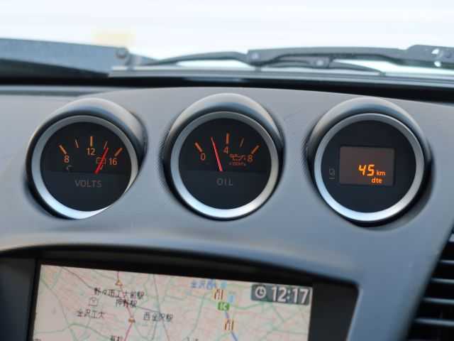 日産 フェアレディ Ｚ 石川県 2007(平19)年 15.3万km ホワイトパール リモコンキー/スペアキー/ステアリングリモコン/純正DVDナビゲーション/バックモニター/HIDライト/電動格納ミラー/純正フロアマット