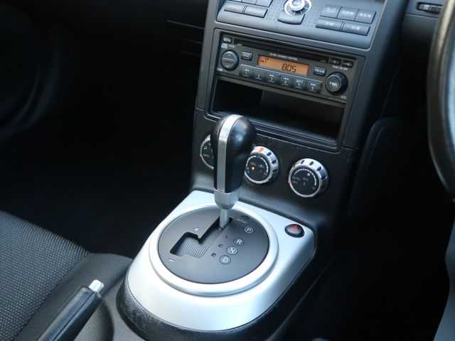 日産 フェアレディ Ｚ 石川県 2007(平19)年 15.3万km ホワイトパール リモコンキー/スペアキー/ステアリングリモコン/純正DVDナビゲーション/バックモニター/HIDライト/電動格納ミラー/純正フロアマット