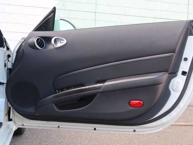 日産 フェアレディ Ｚ 石川県 2007(平19)年 15.3万km ホワイトパール リモコンキー/スペアキー/ステアリングリモコン/純正DVDナビゲーション/バックモニター/HIDライト/電動格納ミラー/純正フロアマット