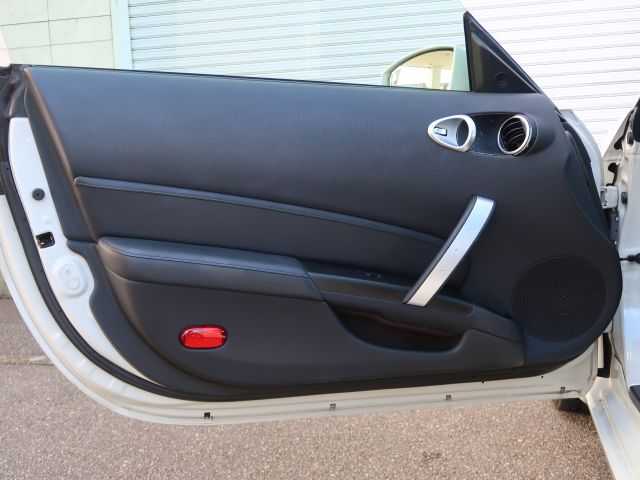 日産 フェアレディ Ｚ 石川県 2007(平19)年 15.3万km ホワイトパール リモコンキー/スペアキー/ステアリングリモコン/純正DVDナビゲーション/バックモニター/HIDライト/電動格納ミラー/純正フロアマット