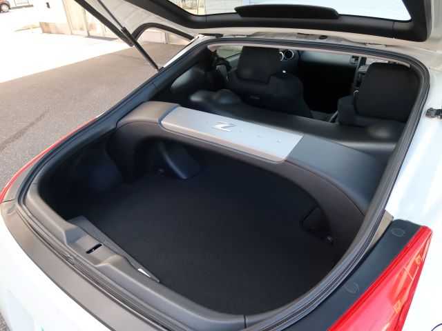 日産 フェアレディ Ｚ 石川県 2007(平19)年 15.3万km ホワイトパール リモコンキー/スペアキー/ステアリングリモコン/純正DVDナビゲーション/バックモニター/HIDライト/電動格納ミラー/純正フロアマット