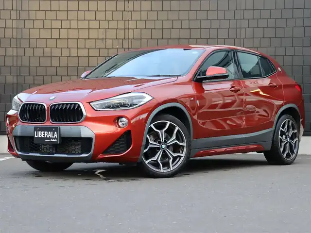 ＢＭＷ Ｘ２ xDrive 18d MスポーツX 宮城県 2019(令1)年 3.9万km サンセットオレンジ 純正ナビ【ＢＴ／ＡＵＸ】/ヘッドアップディスプレイ　/インテリジェントセーフティ/アンビエントライト　/黒レザーシート　/レーンキープアシスト　/前席パワーシート/D席メモリー付き/アダプティブクルーズコントロール　/電動リアゲート　/ダウンヒルアシストコントロール/前後コーナーセンサー/パーキングアシスト/LEDヘッドライト/バックカメラ/前席シートヒーター/純正１９インチＡＷ　/ミラー一体型ＥＴＣ/コンフォートアクセス/禁煙車