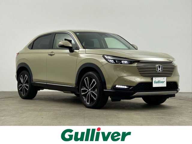 ホンダ ヴェゼル ハイブリッド e:HEV Z 千葉県 2024(令6)年 2万km サンドカーキパール 禁煙車/ワンオーナー/ホンダセンシング/・衝突軽減ブレーキ（CMBS)/・先行車発進お知らせ/・路外逸脱抑制機能/・レーンキープアシスト/・ブラインドスポットシステム/パワーバックドア/純正９型ホンダコネクトディスプレイオーディオ（ナビ付き）/・USB/Bluetooth/フルセグTV/・全方位カメラ/・ビルトインETC2.0/革巻きステアリング/・ステアリングスイッチ/・ステアリングヒーター/・パドルシフト/ハーフレザーシート/・DNシートヒーター/電子パーキング/・ブレーキホールド/置くだけ充電/純正フロアマット/純正18インチAW/オートライト/・LEDヘッドライト/・LEDフォグランプ