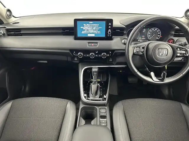 ホンダ ヴェゼル ハイブリッド e:HEV Z 千葉県 2024(令6)年 2万km サンドカーキパール 禁煙車/ワンオーナー/ホンダセンシング/・衝突軽減ブレーキ（CMBS)/・先行車発進お知らせ/・路外逸脱抑制機能/・レーンキープアシスト/・ブラインドスポットシステム/パワーバックドア/純正９型ホンダコネクトディスプレイオーディオ（ナビ付き）/・USB/Bluetooth/フルセグTV/・全方位カメラ/・ビルトインETC2.0/革巻きステアリング/・ステアリングスイッチ/・ステアリングヒーター/・パドルシフト/ハーフレザーシート/・DNシートヒーター/電子パーキング/・ブレーキホールド/置くだけ充電/純正フロアマット/純正18インチAW/オートライト/・LEDヘッドライト/・LEDフォグランプ