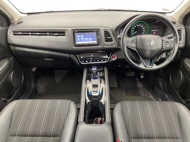 ホンダ ヴェゼル ハイブリッド Z ホンダセンシング 栃木県 2018(平30)年 2.5万km ホワイトオーキッドパール 純正ナビ (VXM-184VFi)/(フルセグTV・Bluetooth・CD・DVD)/バックカメラ/ドライブレコーダー/ホンダセンシング/ ・衝突軽減システム/ ・レーンキープアシスト/ ・オートクルーズコントロール/ ・先行車発進告知/ ・リアアクティブフォースペダル/ハーフレザーシート/シートヒーター/電動パーキングブレーキ/オートホールド/ステアリングスイッチ/パドルシフト/純正アルミホイール/純正フロアマット/スマートキー