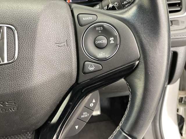 ホンダ ヴェゼル ハイブリッド Z ホンダセンシング 栃木県 2018(平30)年 2.5万km ホワイトオーキッドパール 純正ナビ (VXM-184VFi)/(フルセグTV・Bluetooth・CD・DVD)/バックカメラ/ドライブレコーダー/ホンダセンシング/ ・衝突軽減システム/ ・レーンキープアシスト/ ・オートクルーズコントロール/ ・先行車発進告知/ ・リアアクティブフォースペダル/ハーフレザーシート/シートヒーター/電動パーキングブレーキ/オートホールド/ステアリングスイッチ/パドルシフト/純正アルミホイール/純正フロアマット/スマートキー