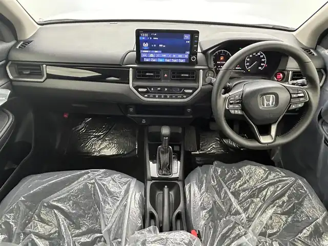 ホンダ ＷＲ－Ｖ Z+ 熊本県 2024(令6)年 0.1万km未満 プラチナホワイトパール Honda SENSING/〇衝突軽減ブレーキ（CMBS）/〇先行車発進お知らせ機能/〇歩行者事故低減ステアリング/〇路外逸脱抑制機能/〇標識認識機能/〇アダプティブクルーズコントロール（ACC）/〇車線維持支援システム（LKAS）/〇誤発進抑制機能/〇後方誤発進抑制機能/〇近距離衝突軽減ブレーキ/〇急アクセル抑制機能/〇パーキングセンサーシステム/〇オートハイビーム/純正9インチHondaコネクトナビ LXM242ZFNi/(フルセグＴＶ/Ａｐｐｌｅ　ＣａｒＰｌａｙ/Ｂｌｕｅｔｏｏｔｈ)/バックカメラ/パドルシフト/コンビシート(プライムスムースＸファブリック)/ルーフレール/純正17インチAW/オートLEDヘッドライト/保証書