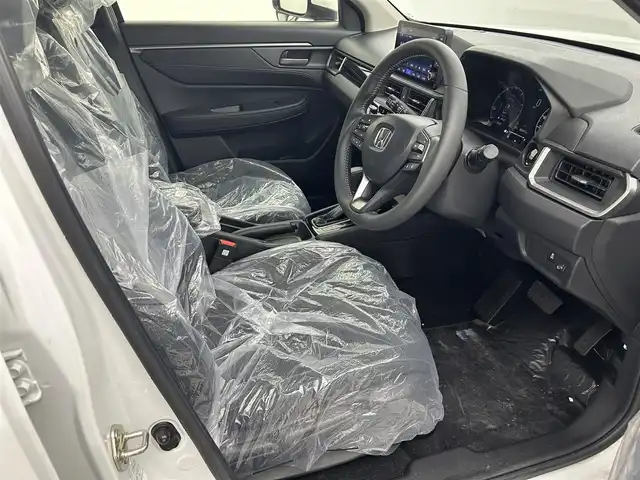 ホンダ ＷＲ－Ｖ Z+ 熊本県 2024(令6)年 0.1万km未満 プラチナホワイトパール Honda SENSING/〇衝突軽減ブレーキ（CMBS）/〇先行車発進お知らせ機能/〇歩行者事故低減ステアリング/〇路外逸脱抑制機能/〇標識認識機能/〇アダプティブクルーズコントロール（ACC）/〇車線維持支援システム（LKAS）/〇誤発進抑制機能/〇後方誤発進抑制機能/〇近距離衝突軽減ブレーキ/〇急アクセル抑制機能/〇パーキングセンサーシステム/〇オートハイビーム/純正9インチHondaコネクトナビ LXM242ZFNi/(フルセグＴＶ/Ａｐｐｌｅ　ＣａｒＰｌａｙ/Ｂｌｕｅｔｏｏｔｈ)/バックカメラ/パドルシフト/コンビシート(プライムスムースＸファブリック)/ルーフレール/純正17インチAW/オートLEDヘッドライト/保証書