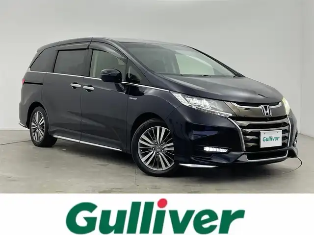 ホンダ オデッセイ ハイブリッド アブソルート・EXホンダセンジング 富山県 2019(平31)年 8.8万km プレミアムヴィーナスブラックP ワンオーナー/純正8インチナビ【VXM-197VFi】/(AM/FM/CD/DVD/USB/BT/HDMI)/フルセグTV/アラウンドビューモニター/純正フリップダウンモニター/社外AW付き冬タイヤ積込/両側パワースライドドア/衝突被害軽減ブレーキ/アダプティブクルーズコントロール/レーンキープアシスト/コーナーセンサー前後/オートLEDヘッドライト/ブラインドスポットモニター/ハーフレザーシート/前席パワーシート/ビルトインETC2.0/ドライブレコーダー/スマートキー/プッシュスタート/ドアバイザー/純正フロアマット/取扱説明書/保証書