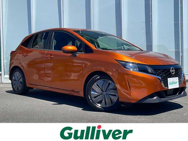 日産 ノート X 神奈川県 2022(令4)年 0.3万km オレンジ スマートキー　/プッシュスタート/純正ナビ（CD　ワンセグ）/Bluetooth/デジタルインナーミラー　/全方位カメラ　　/コーナーセンサー前後/純正フロアマット/オートマチックハイビーム　/ABS　/横滑り防止装置　/衝突被害軽減システム　/カーテンエアバック