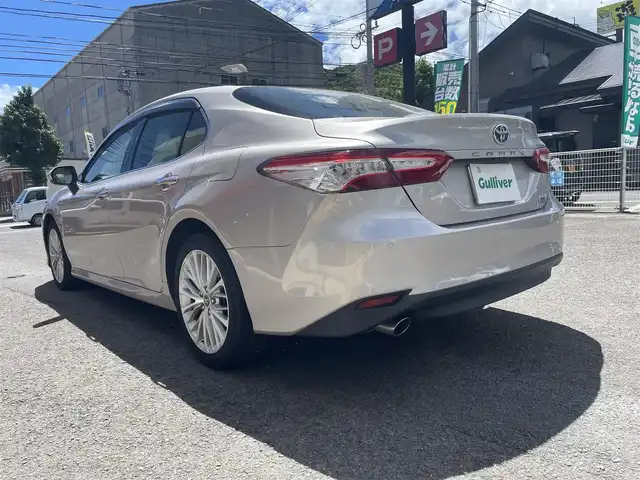 トヨタ カムリ G レザーパッケージ 長崎県 2019(平31)年 7.2万km スティールブロンドM トヨタセーフティセンス/・衝突被害軽減ブレーキ/・レーダークルーズコントロール/・レーンキープアシスト/・オートマチックハイビーム/メーカーOP/SDナビ/・Bluetooth接続/・フルセグTV/・DVD再生/バックカメラ/ビルトインETC2.0/LEDオートヘッドライト/レザーシート/・シートヒーター/・パワーシート/コーナーセンサー/MTモード付AT/電子パーキング/オートホールド機能/防眩ルームミラー/ISOFIX/ALLオートPW///////////////////