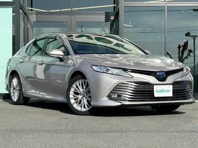 トヨタ カムリ G レザーパッケージ 愛媛県 2019(平31)年 7.2万km スティールブロンドM 純正ナビ(AM/FM/CD/DVD/BD/BT/フルセグTV)/バックカメラ/トヨタセーフティセンス/レーダークルーズコントロール/ブラインドスポットモニター/衝突被害軽減装置/車線逸脱防止装置/オートマチックハイビーム/LEDヘッドライト/ヘッドアップディスプレイ/D/N席パワーシート/D/N席シートヒーター/白レザー/電格ミラー/ヒートミラー/電動パーキングブレーキ/AutoHold/ECO/NORMAL/SPORT/現状サマー(純正AW)(235/45/R18)/YOKOHAMA ADVAN dB V522