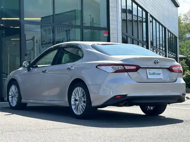 トヨタ カムリ G レザーパッケージ 愛媛県 2019(平31)年 7.2万km スティールブロンドM 純正ナビ(AM/FM/CD/DVD/BD/BT/フルセグTV)/バックカメラ/トヨタセーフティセンス/レーダークルーズコントロール/ブラインドスポットモニター/衝突被害軽減装置/車線逸脱防止装置/オートマチックハイビーム/LEDヘッドライト/ヘッドアップディスプレイ/D/N席パワーシート/D/N席シートヒーター/白レザー/電格ミラー/ヒートミラー/電動パーキングブレーキ/AutoHold/ECO/NORMAL/SPORT/現状サマー(純正AW)(235/45/R18)/YOKOHAMA ADVAN dB V522