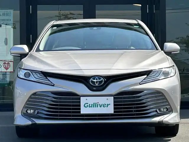 トヨタ カムリ G レザーパッケージ 愛媛県 2019(平31)年 7.2万km スティールブロンドM 純正ナビ(AM/FM/CD/DVD/BD/BT/フルセグTV)/バックカメラ/トヨタセーフティセンス/レーダークルーズコントロール/ブラインドスポットモニター/衝突被害軽減装置/車線逸脱防止装置/オートマチックハイビーム/LEDヘッドライト/ヘッドアップディスプレイ/D/N席パワーシート/D/N席シートヒーター/白レザー/電格ミラー/ヒートミラー/電動パーキングブレーキ/AutoHold/ECO/NORMAL/SPORT/現状サマー(純正AW)(235/45/R18)/YOKOHAMA ADVAN dB V522