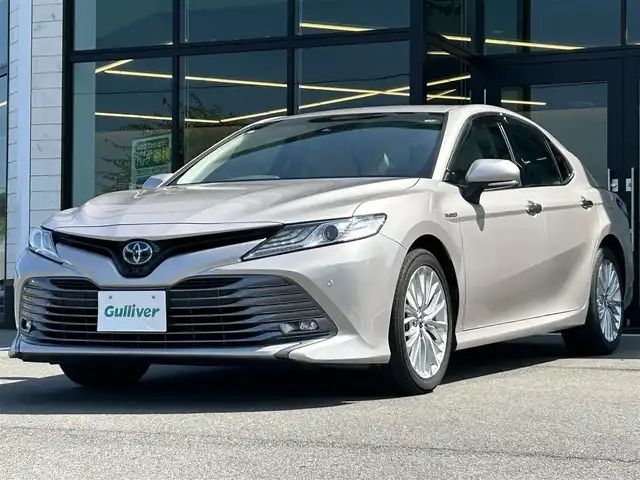 トヨタ カムリ G レザーパッケージ 愛媛県 2019(平31)年 7.2万km スティールブロンドM 純正ナビ(AM/FM/CD/DVD/BD/BT/フルセグTV)/バックカメラ/トヨタセーフティセンス/レーダークルーズコントロール/ブラインドスポットモニター/衝突被害軽減装置/車線逸脱防止装置/オートマチックハイビーム/LEDヘッドライト/ヘッドアップディスプレイ/D/N席パワーシート/D/N席シートヒーター/白レザー/電格ミラー/ヒートミラー/電動パーキングブレーキ/AutoHold/ECO/NORMAL/SPORT/現状サマー(純正AW)(235/45/R18)/YOKOHAMA ADVAN dB V522