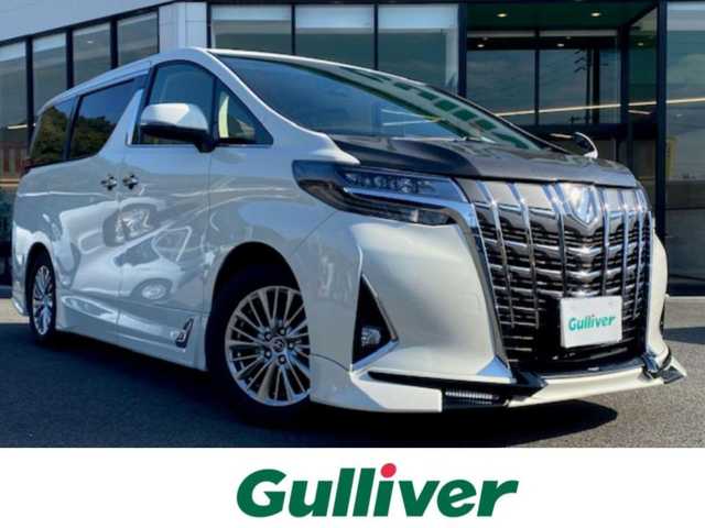 トヨタ アルファード G 兵庫県 2018(平30)年 1.9万km ラグジュアリーホワイトパールクリスタルシャインガラスフレーク 純正ナビ（AM/FM/BT/AUX)/・フルセグTV/バックモニター/追従付きクルーズコントロール/クリアランスソナー/レーンアシスト/パーキングサポートブレーキ/衝突軽減システム/リヤクロストラヒックアラート/シートヒーター＆クール/パワーシート（運転席＆助手席）/サンルーフ/フリップダウンモニター（リモコン付き）/ステアリングスイッチ/電動リアゲート/オートライト/ECOモード/純正マット/ビルトインETC2.0
