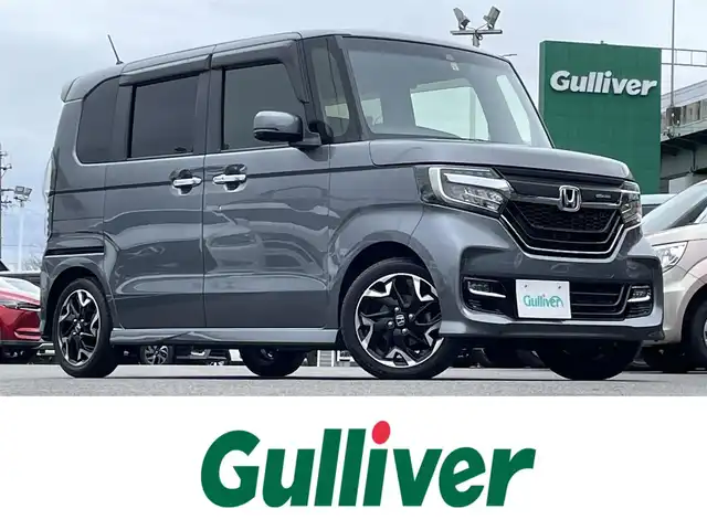 ホンダ Ｎ ＢＯＸ カスタム G L ターボ ホンダセンシング 愛知県 2018(平30)年 7.3万km シャイニンググレーM スマートキー/プッシュスタート/純正ナビ/フルセグTV/BT/バックカメラ/純正15インチAW/両側パワースライドドア/ホンダセンシング/レーダークルーズコントロール/ビルトインETC/純正ドライブレコーダー/純正フロアマット/レザー調シートカバー/LEDヘッドライト