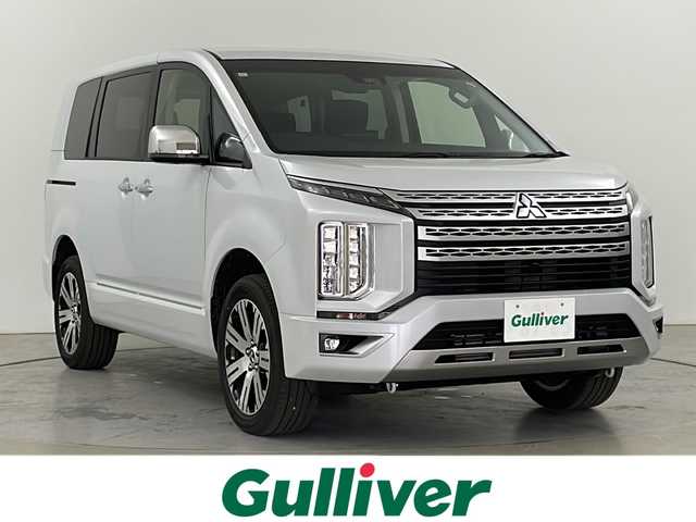 三菱 デリカＤ：５ P 道央・札幌 2024(令6)年 1.2万km ホワイトダイヤモンド ・４WD  / e-Assist/・衝突被害軽減ブレーキシステム/・車線逸脱警報システム/・レーダークルーズコントロールシステム/・レーンチェンジアシスト/・社外10.1インチフローティングナビ/・DVD.CD.SD.Bluetooth/・フルセグ/バックカメラ/・両側パワースライドドア /パワーバックドア /・ブラインドスポットモニター/・パワーシート/シートヒーター/・ステアリングヒーター /パドルシフト/・LEDライト/オートライト/・オートマチックハイビーム
