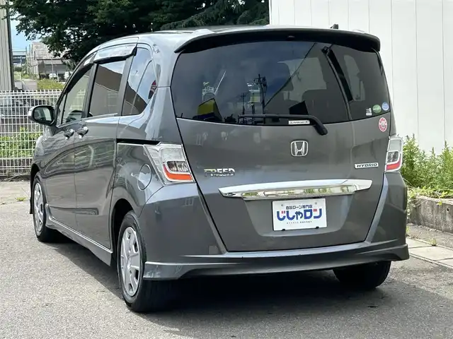 ホンダ フリード ハイブリット ジャストセレクション 福島県 2013(平25)年 11.4万km ポリッシュドメタルメタリック (株)IDOMが運営する【じしゃロン福島店】の自社ローン専用車両になります。こちらは現金またはオートローンご利用時の価格です。自社ローンご希望の方は別途その旨お申付け下さい/ＳＤナビ/フルセグTV/Bluetooth/片側パワースライドドア/ドアバイザー/ETC/３列シート/後席モニター