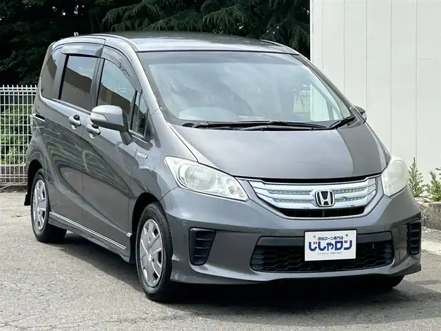 ホンダ フリード ハイブリット ジャストセレクション 福島県 2013(平25)年 11.4万km ポリッシュドメタルメタリック (株)IDOMが運営する【じしゃロン福島店】の自社ローン専用車両になります。こちらは現金またはオートローンご利用時の価格です。自社ローンご希望の方は別途その旨お申付け下さい/ＳＤナビ/フルセグTV/Bluetooth/片側パワースライドドア/ドアバイザー/ETC/３列シート/後席モニター