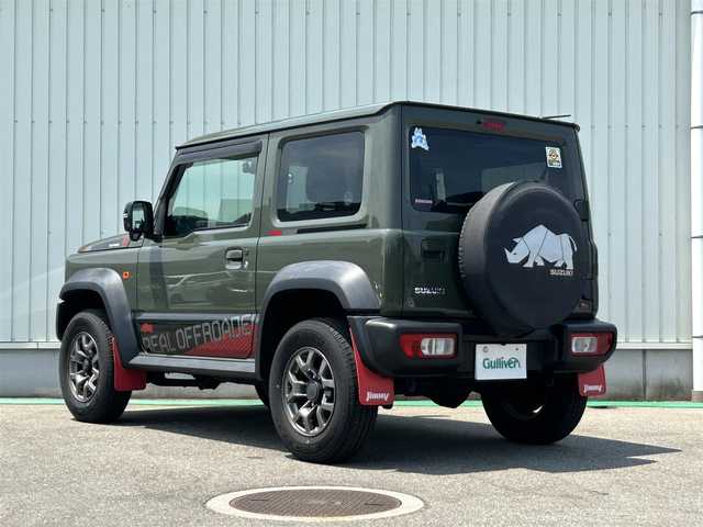 スズキ ジムニー シエラ JC 富山県 2021(令3)年 6.7万km ジャングルグリーン ワンオーナー/純正15インチAW/フルセグテレビ/バックカメラ/Bluetooth/プッシュスタート/革巻きステアリングホール/LEDヘッドランプ/ヘッドランプウォッシャー/背面タイヤハーフカバー/Suzuki Safety Support（予防安全技術）/デュアルセンサーブレーキサポート(DSBS)/レーダークルーズコントロール/先行者発進お知らせ機能/標識認識機能/ふらつき警報機能/車線逸脱警報機能/ハイビームアシスト/エマージェンシーストップシグナル/ヒルホールドコントロール/ESP 車両走行安定補助システム/軽量衝撃吸収ボディーTECT/フォグランプ/スペアキー/5速MT/ストラーダ製10V型ナビ