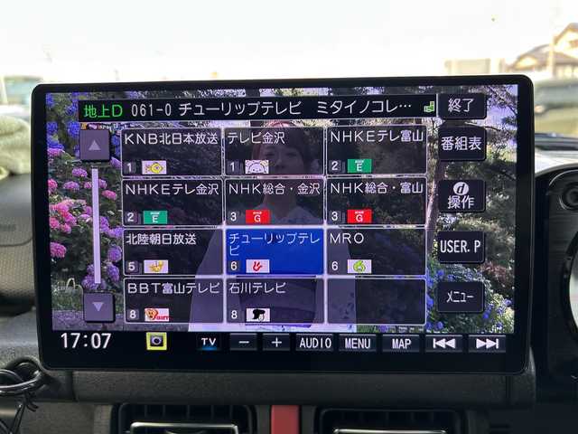 スズキ ジムニー シエラ JC 富山県 2021(令3)年 6.7万km ジャングルグリーン ワンオーナー/純正15インチAW/フルセグテレビ/バックカメラ/Bluetooth/プッシュスタート/革巻きステアリングホール/LEDヘッドランプ/ヘッドランプウォッシャー/背面タイヤハーフカバー/Suzuki Safety Support（予防安全技術）/デュアルセンサーブレーキサポート(DSBS)/レーダークルーズコントロール/先行者発進お知らせ機能/標識認識機能/ふらつき警報機能/車線逸脱警報機能/ハイビームアシスト/エマージェンシーストップシグナル/ヒルホールドコントロール/ESP 車両走行安定補助システム/軽量衝撃吸収ボディーTECT/フォグランプ/スペアキー/5速MT/ストラーダ製10V型ナビ