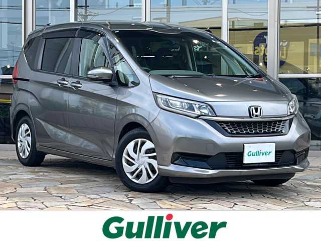 ホンダ フリード G ホンダセンシング 静岡県 2020(令2)年 3.6万km スーパープラチナグレーメタリック 純正ナビ/・CD/DVD/・FM/AM/・フルセグTV/・SD/Music Rack/・USB/iPod/・Bluetooth/主要装備/・バックカメラ/・ＥＴＣ/・ＬＥＤヘッドライト/・アクティブコーナリングライト/・両側パワースライドドア/・運転席＋助手席シートヒーター/・前後ドライブレコーダー/・ホンダセンシング/・アイドリングストップ/・レーダークルコン/・純正マット/・オートライト
