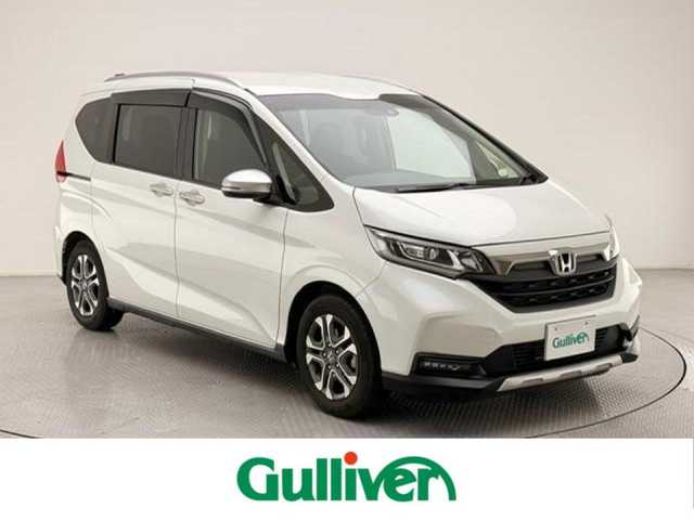 ホンダ フリード クロスター ホンダセンシング 兵庫県 2022(令4)年 1.7万km プラチナホワイトパール 社外8インチメモリナビ/(AVIC-RL812)/フルセグ CD DVD BT MSV/バックカメラ/両側パワースライド/レーダークルーズコントロール/衝突軽減ブレーキ/LKAS/コーナーセンサー/標識認識/ビルトインETC/LEDヘッドライト/LEDフォグ/オートライト/ハーフレザーシート/シートヒーター/ドアバイザー/スマートキー