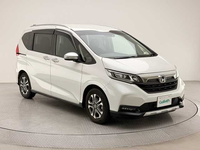 ホンダ フリード クロスター ホンダセンシング 兵庫県 2022(令4)年 1.7万km プラチナホワイトパール 社外8インチメモリナビ/(AVIC-RL812)/フルセグ CD DVD BT MSV/バックカメラ/両側パワースライド/レーダークルーズコントロール/衝突軽減ブレーキ/LKAS/コーナーセンサー/標識認識/ビルトインETC/LEDヘッドライト/LEDフォグ/オートライト/ハーフレザーシート/シートヒーター/ドアバイザー/スマートキー