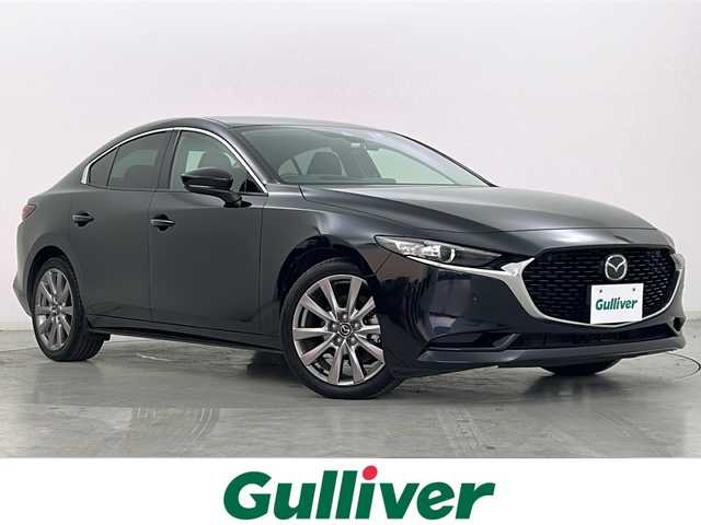 マツダ マツダ３セダン 15S ツーリング 宮城県 2020(令2)年 5.6万km ジェットブラックマイカ 禁煙車/ワンオーナー/i-ACTIVESENSE/・衝突軽減ブレーキ/・レーンキープアシスト/・アダプティブクルーズコントロール/・オートハイビームアシスト/・ブラインドスポットモニター/・ヘッドアップディスプレイ/マツダコネクトナビ/・CD.DVD.BT.USB.HDMI/フルセグTV/バックモニター/ETC/社外ドライブレコーダー（FR）/LEDヘッドライト/アイドリングストップ/横滑り防止装置/電動パーキングブレーキ/オートホールド/ステアリングスイッチ/プッシュスタート/スマートキー2個/純正18インチアルミホイール/純正フロアマット